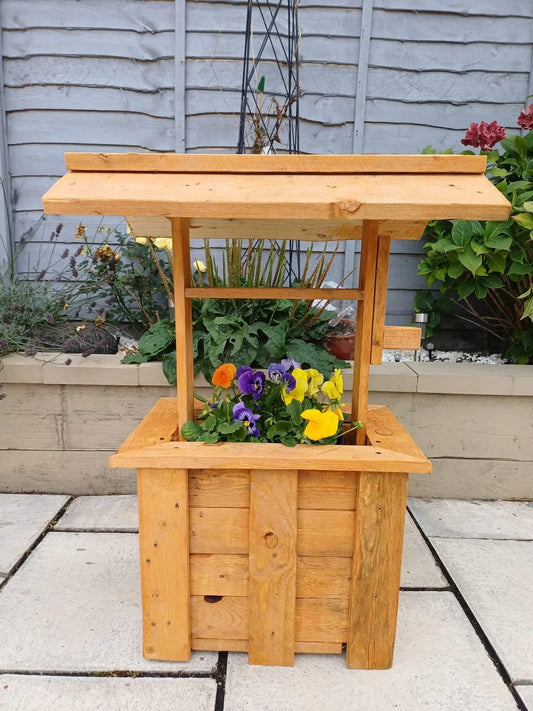 THE LEGENDARY WISHING WELL Gleghorns Garden Services